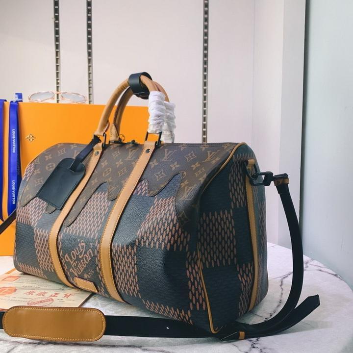 LOUIS VUITTON - SAC DE VOYAGE 